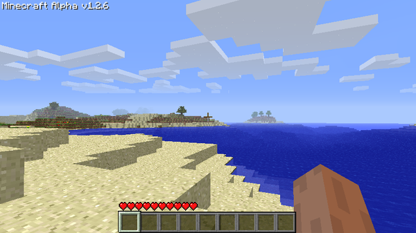 Minecraft Alpha v1.2.6 gameplay: a beach, the ocean, and distant trees, with the version number top left and the health bar and hotbar below